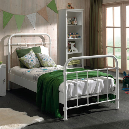 white single metal bed frame with mattress and bedding in bedroom