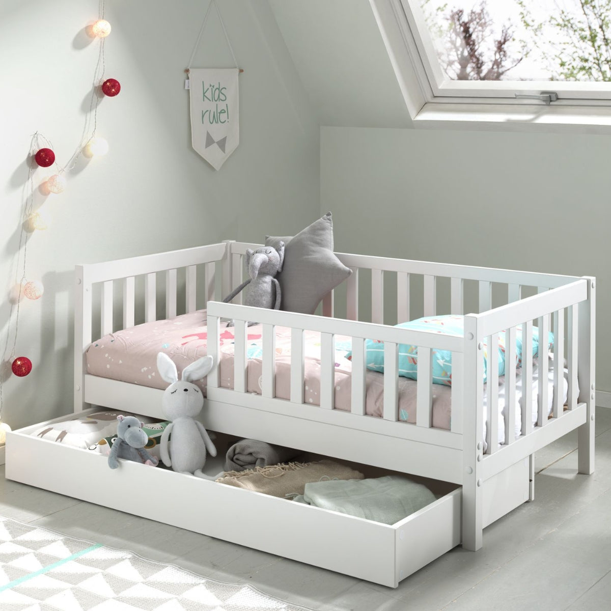 vipack toddler bed white 140x70cm with open underbed storage drawer in nursery bedroom